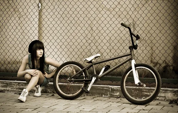 Girl, bike, the fence, bmx