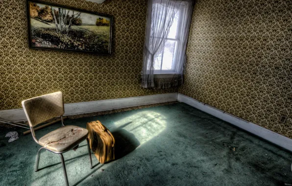 Window, chair, suitcase