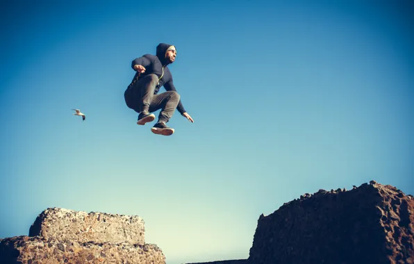 The sky, the sun, stones, jump, bird, hat, sneakers, Seagull
