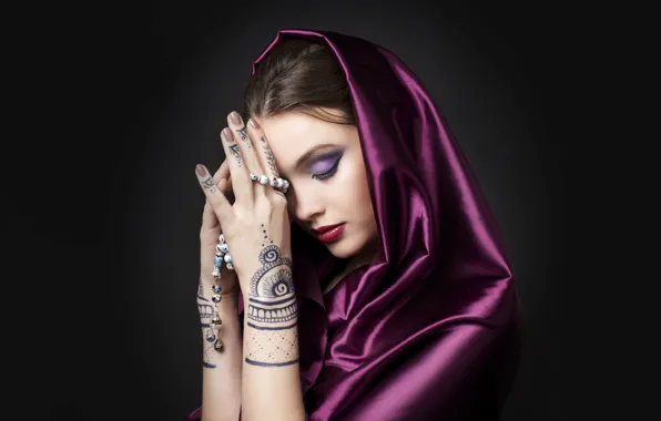 Tattoos, makeup, closed eyes, amulets