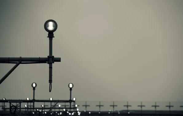 Transport, lights, the fence, airport, the gray sky