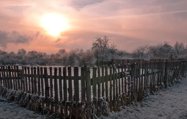 Winter, sunset, the fence, village
