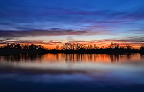 The sky, trees, branches, lake, reflection, mirror, silhouette, twilight