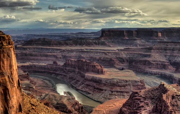 The sky, clouds, mountains, river, rocks, canyon