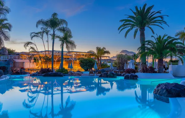 Stones, palm trees, the evening, pool, the hotel, resort, Spain, sunbeds