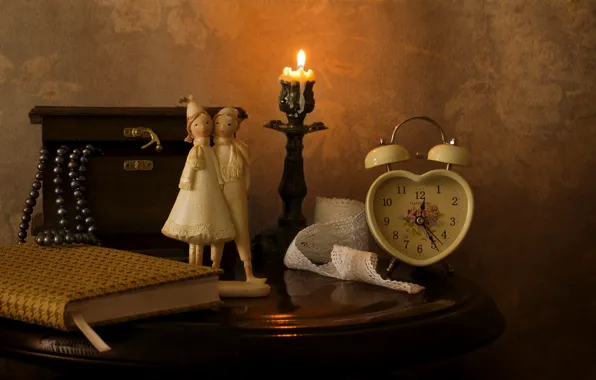 Watch, candle, necklace, alarm clock, box, book, figurine