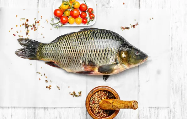 Table, fish, tomatoes, spices, mortar