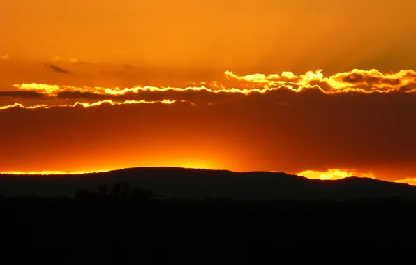 The sky, clouds, sunset, hills, horizon