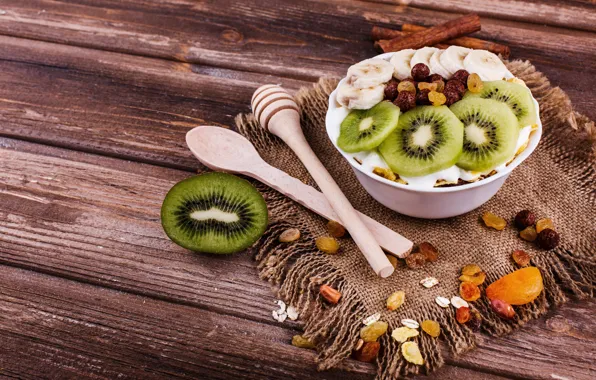 Breakfast, kiwi, nuts, banana, wood, napkin, nuts, raisins