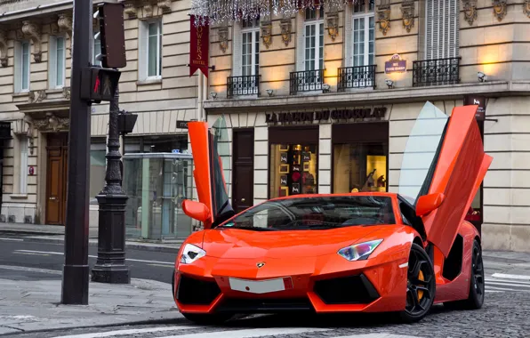 Picture street, building, traffic light, supercar, lamborghini, supercar, street, orange