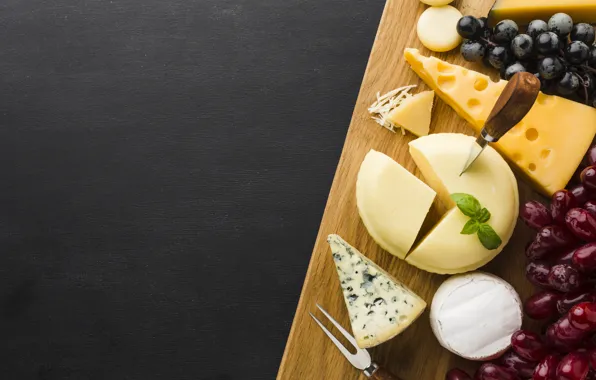 Cheese, grapes, knife