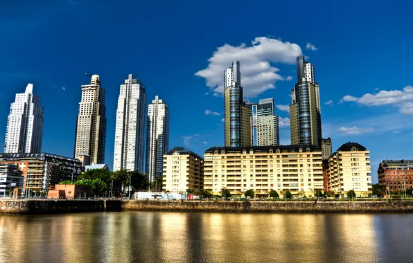 Water, the city, skyscrapers, blue sky, the Golden hotel, Buenos Aires