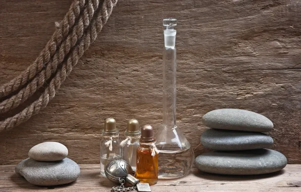 Stones, oil, bottle