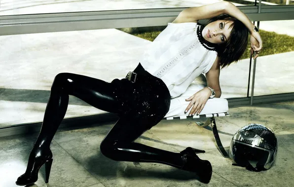 Picture girl, model, actress, helmet, in the pose, Milla Jovovich, white blouse, latex pants