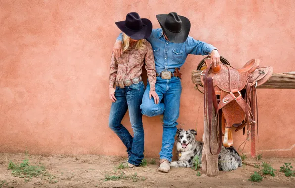 Picture woman, dog, man, cowboys, saddle