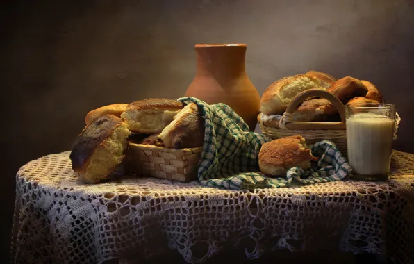 Glass, table, basket, towel, milk, bread, pitcher, bread