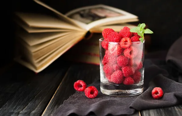 Glass, glass, berries, raspberry, the dark background, Board, books, fabric