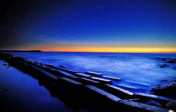 Picture sea, the sky, sunset, stones, blocks, twilight