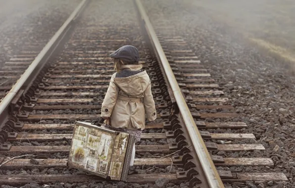 Girl, railroad, suitcase