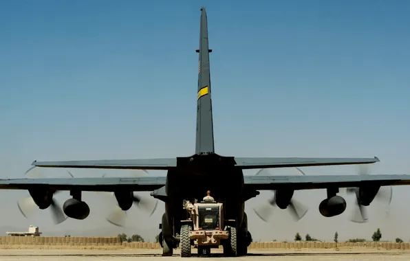 Picture the airfield, Afghanistan, military transport aircraft, C-130 Hercules, loading equipment, operating base Farah, C-130H "Hercules"