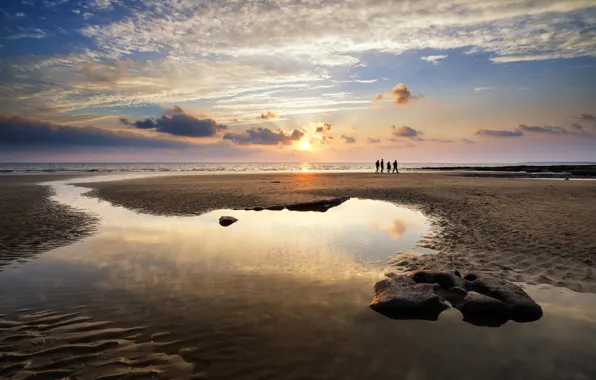 Sand, sea, beach, the sky, the sun, clouds, people, dawn
