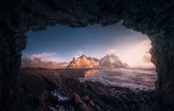 Sea, mountains, cave