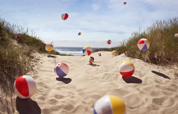 Sand, beach, grass, balls, guy, in the sand