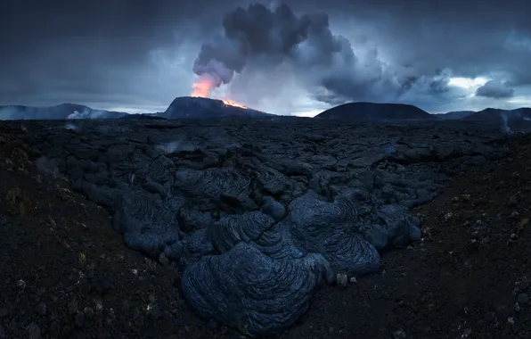 Night, the volcano, the eruption, lava