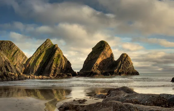 Sand, sea, the sky, clouds, light, mountains, rocks, shore