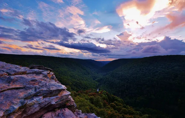 The sky, clouds, trees, mountains