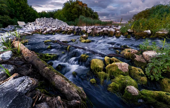 Grass, clouds, stones, horizon, river, the flow of water, boulders, the beauty of nature