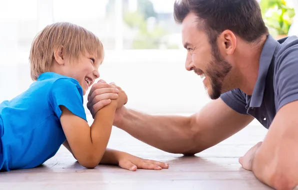 Picture play, fun, Father, son arm wrestling