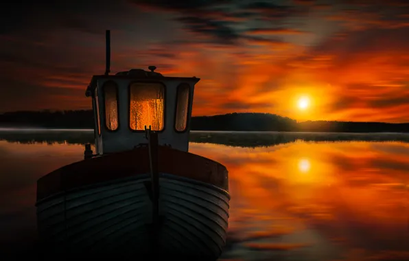 The sky, water, sunset, boat, pond