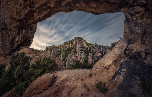 The sky, clouds, mountains, stones, rocks, tops, view, arch
