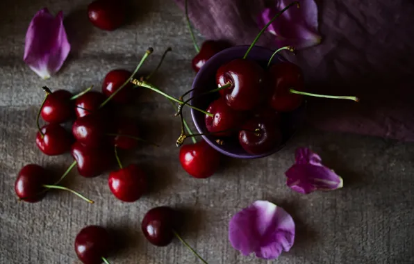 Cherry, berries, the dark background, table, petals, fabric, pink, bowl