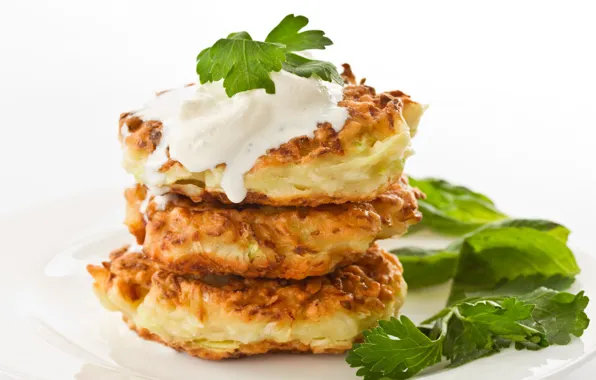 Parsley, sour cream, pancakes