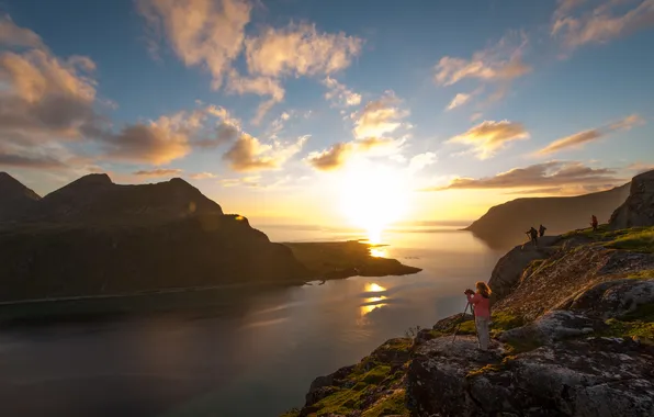 The sun, clouds, rays, sunset, people, rocks, dawn, haze