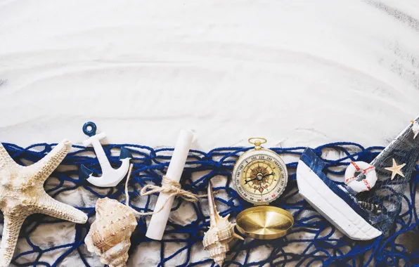 Sand, network, boat, shell, compass, sea