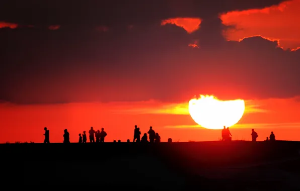 The sun, sunset, people, silhouettes