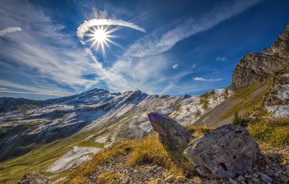 The sun, clouds, rays, light, mountains, blue, stones, the slopes