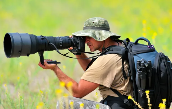 Photographer, man, professional, photo camera, magnifying glasses