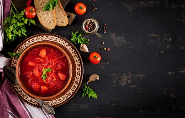 Greens, bread, soup, pepper, tomato, tomato, tomatoes, black background