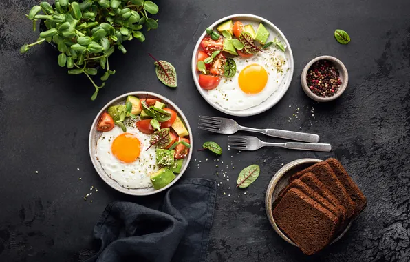 Greens, the dark background, eggs, plates, scrambled eggs