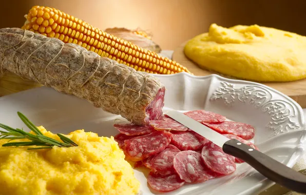 Picture greens, corn, plate, knife, slices, sausage, puree