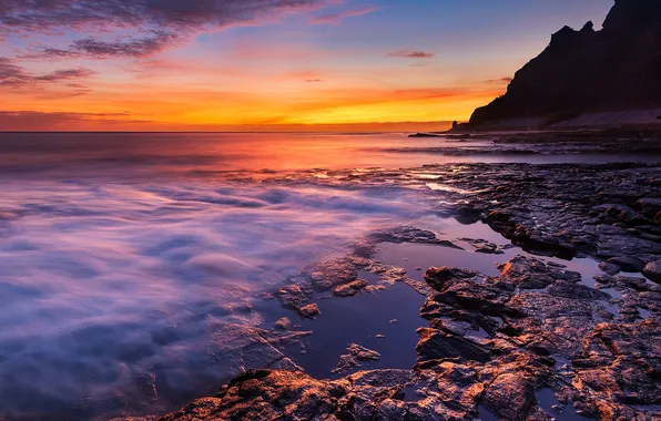 Sea, the sky, clouds, sunset, stones, rocks, shore, the evening