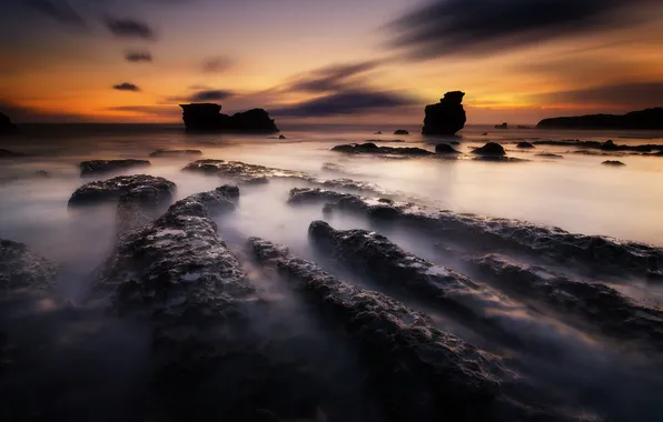 Nature, the ocean, rocks, dawn