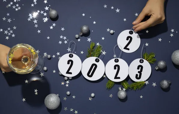 Balls, circles, branches, wine, silver, glass, hands, figures
