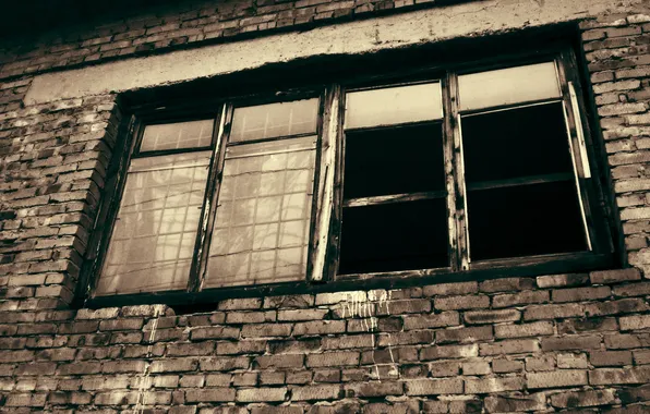 Picture window, grille, brick wall