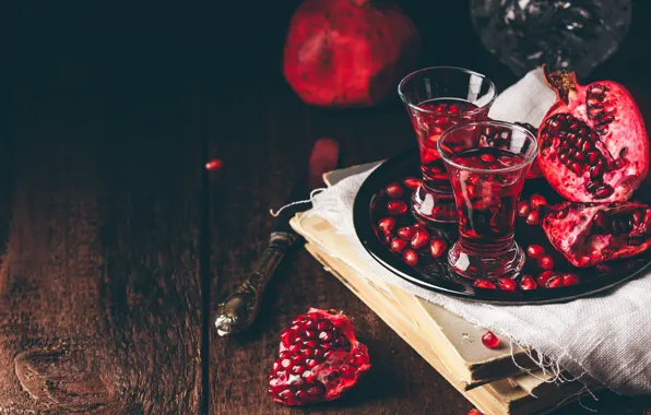 The dark background, table, Board, books, grain, glasses, juice, alcohol