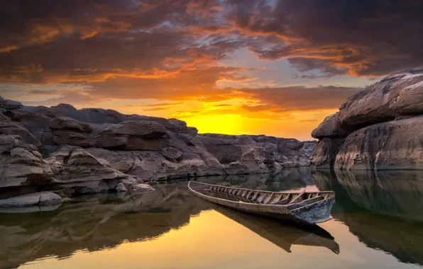 Picture the sky, clouds, sunset, stones, rocks, boat, canyon, Thailand